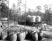 Turpentine storage tanks at still