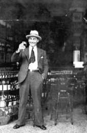 Man raising his glass in a toast