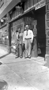 Arthur William Morrison with a friend outside his drugstore - Miami, Florida.