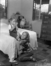 Judy Partin helping sister Kathy with her boots - Kissimmee, Florida.