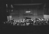 View showing The Telephone Hour radio program orchestra performing a concert.