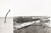 Two views showing hurricane damage to the Overseas Railway.