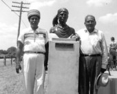 Seminole Indian leaders with a bust of Chief Osceola.
