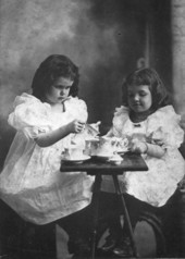 Lucile Lightsey (later Alexander) and Olive Smith playing tea party.