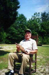 John K. McLane's grandson with the pine knot.
