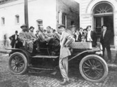 Men driving an antique car from Tampa to Jacksonville