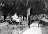 Sarah and Elizabeth Hargreaves in wagon - De Land, Florida