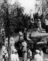 People admiring a walk through the Florida pavilion at World's Fair in New York