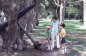 Mother and children looking at anchor at Kingsley Plantation State Historic Site- Fort George Island, Florida