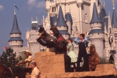 Disney characters on parade in front of the castle - Walt Disney World, Florida.