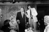 Jackie Gleason standing next to an unidentified man holding a trophy - Fort Lauderdale, Florida.