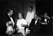 Tonight Show announcer Ed McMahon, left, and actor Jackie Gleason, second from right, at Le Club International regatta - Fort Lauderdale, Florida.