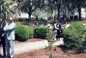 View looking toward crowd gathered behind the old capitol by Waller Park - Tallahassee, Florida.