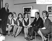Florida Governor Haydon Burns sitting with women at the Florida Showcase in New York City.