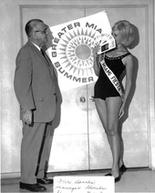 Jim Larche, manager of the Florida Showcase, with Miss Miami Fiesta in New York City.