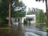 View showing flood waters around building after Hurricane Dennis in Apalachicola, Florida.