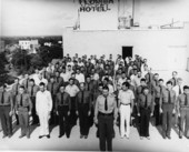 1941 recruit class of the Florida Highway Patrol performing calisthenics on top of the New Florida Hotel in Lakeland, Florida.
