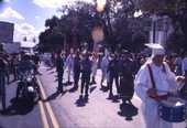 View showing KKK members marching north on South Monroe Street during a rally in Tallahassee, Florida.