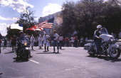 KKK members being escorted by motorcycle police during rally on South Monroe Street in Tallahassee, Florida.