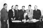 Florida Governor Spessard Holland signing a bill.