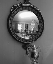 Governor Bryant's wife, Julia, reflecting in the Governor's mansion mirror.