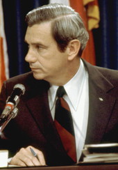 Florida Governor Reubin Askew at a microphone