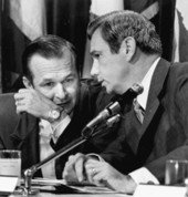 Florida Governor Askew confers with Doyle Conner during a Cabinet meeting.