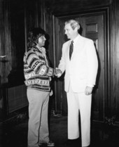 Florida Governor Reubin Askew shaking hands with Joe Dan Osceola