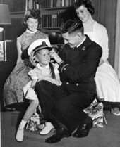 LeRoy Collins Junior tries his hat on his sister Darby.