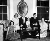Florida Governor LeRoy Collins and his family sitting on a couch.