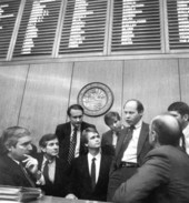Representatives conferring on the floor of the Florida House