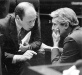 Senators conferring on the floor of the Florida Senate.