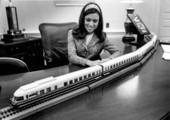 Governor Askew's secretary with model of a train.