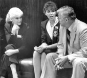 Senate pages questioning Senator about bill.