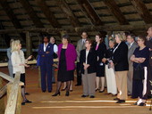 Members of the House Tourism Committee being given a tour of the council house at San Luis Mission - Tallahassee, Florida.