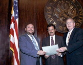 Florida State Senators presenting resolution to unidentified man during the 1994 Legislative Session - Tallahassee, Florida.