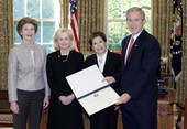Florida's First Lady Columba Bush and Mission San Luis Executive Director Bonnie McEwan accepting the 2006 Preserve America Presidential Award at the White House.