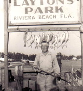Unidentified man posing with his catch of 13 Pompano at Layton's Park - Riviera Beach, Florida