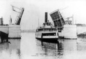 Favorite Line steamboat "Pokanoket" passing Franklin Street drawbridge - Tampa, Florida.
