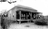 Family posed on porch