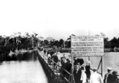 Group walking along pier to fairy-land - Miami Beach, Florida.