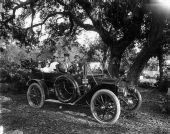 Cottrell family with friend in a Premier Touring car - Pensacola, Florida.