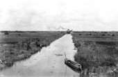 Dredge at a distance in the Tamiami Canal