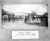 Spanish-American war soldiers on a Tampa street with their horses.