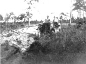 "Perry and Jim making a hard road" - Alva, Florida