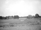 Plane taking off from the College Arms Hotel golf course - De Land, Florida