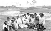 Mr. Hirsch with caddies at the Coral Gables Country Club golf course