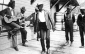 African American men spending the sunday afternoon with music
