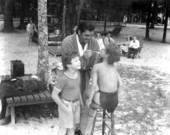 Johnie Sheffield and Johnny Weissmuller making up Johnie's stand-in during filming of "Tarzan's Secret Treasure".