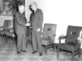 Members at Florida State Chamber of Commerce board meeting shaking hands